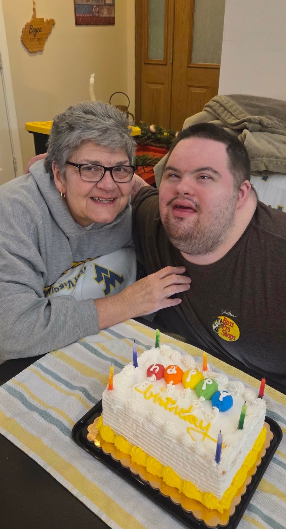 A board member celebrating a birthday with a loved one